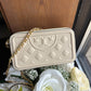 Tory Burch quilted cream leather chain crossbody front view