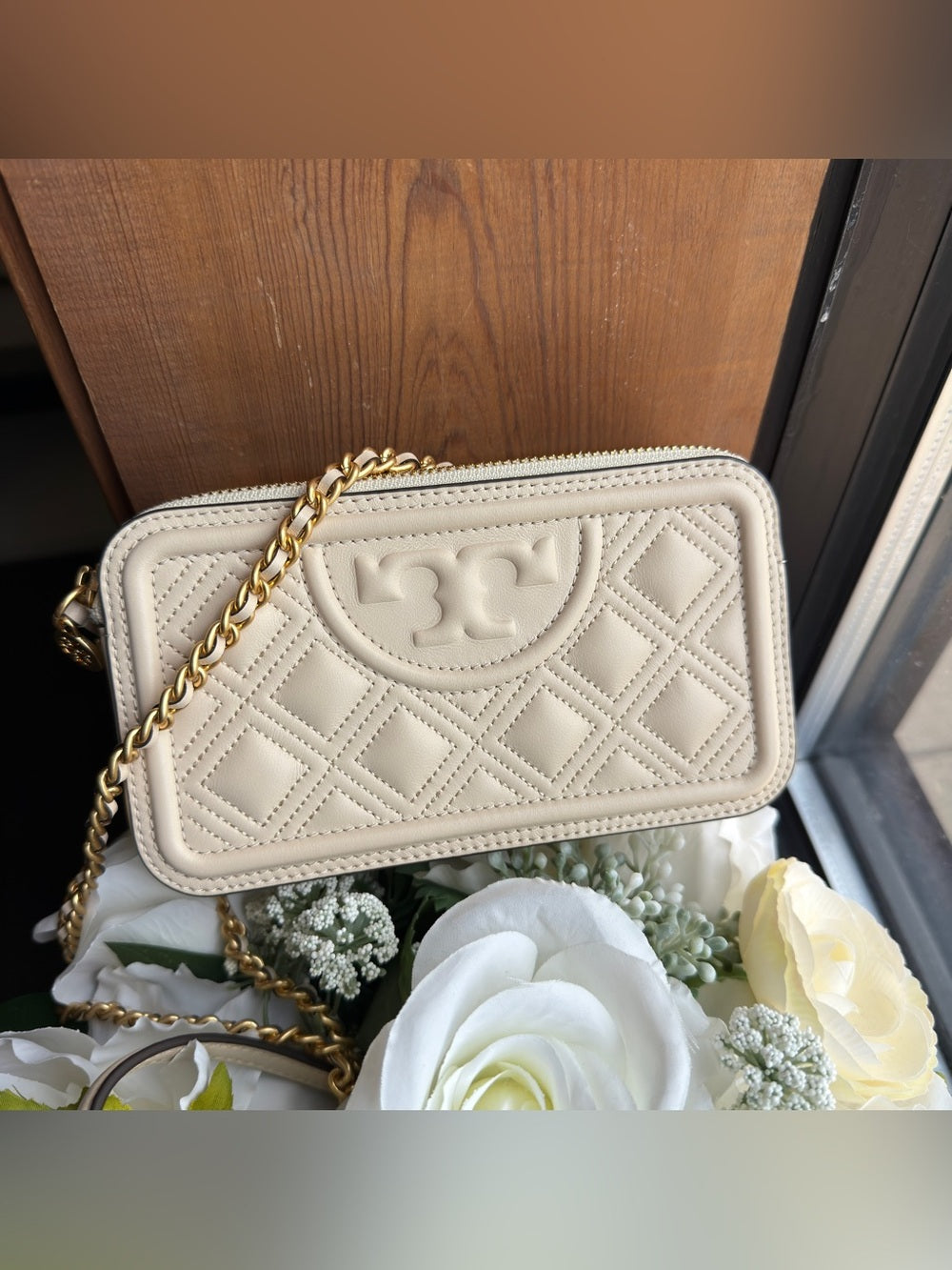 Tory Burch quilted cream leather chain crossbody front view