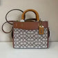 Coach C6444 Rogue 25 brown and tan satchel bag front view