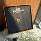 Coach F27135 rose gold heart necklace front view