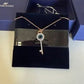 Swarovski rose gold key pendant necklace front view