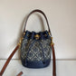 Tory Burch blue and brown mini bucket bag front view