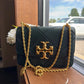 Tory Burch Fleming dark green leather shoulder bag front view