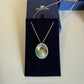 Swarovski green and silver crystal pendant necklace detail