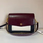Tory Burch Robinson burgundy black and cream crossbody bag detail
