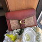 Coach 6909 burgundy and tan colorblock chain crossbody bag detail