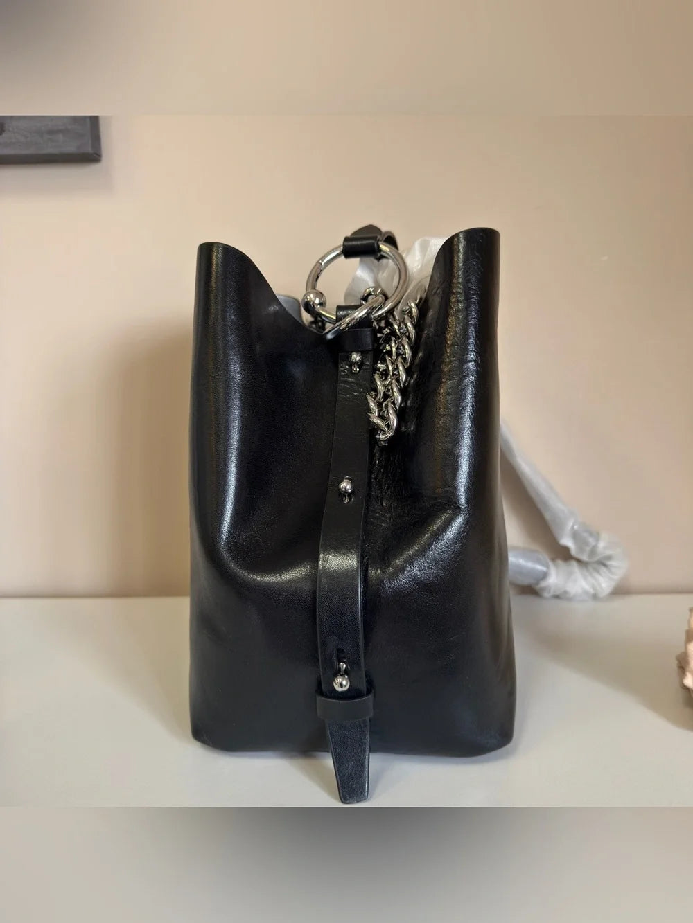 Rebecca Minkoff black leather structured backpack detail