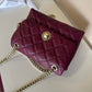Kate Spade quilted shoulder bag in deep berry detail