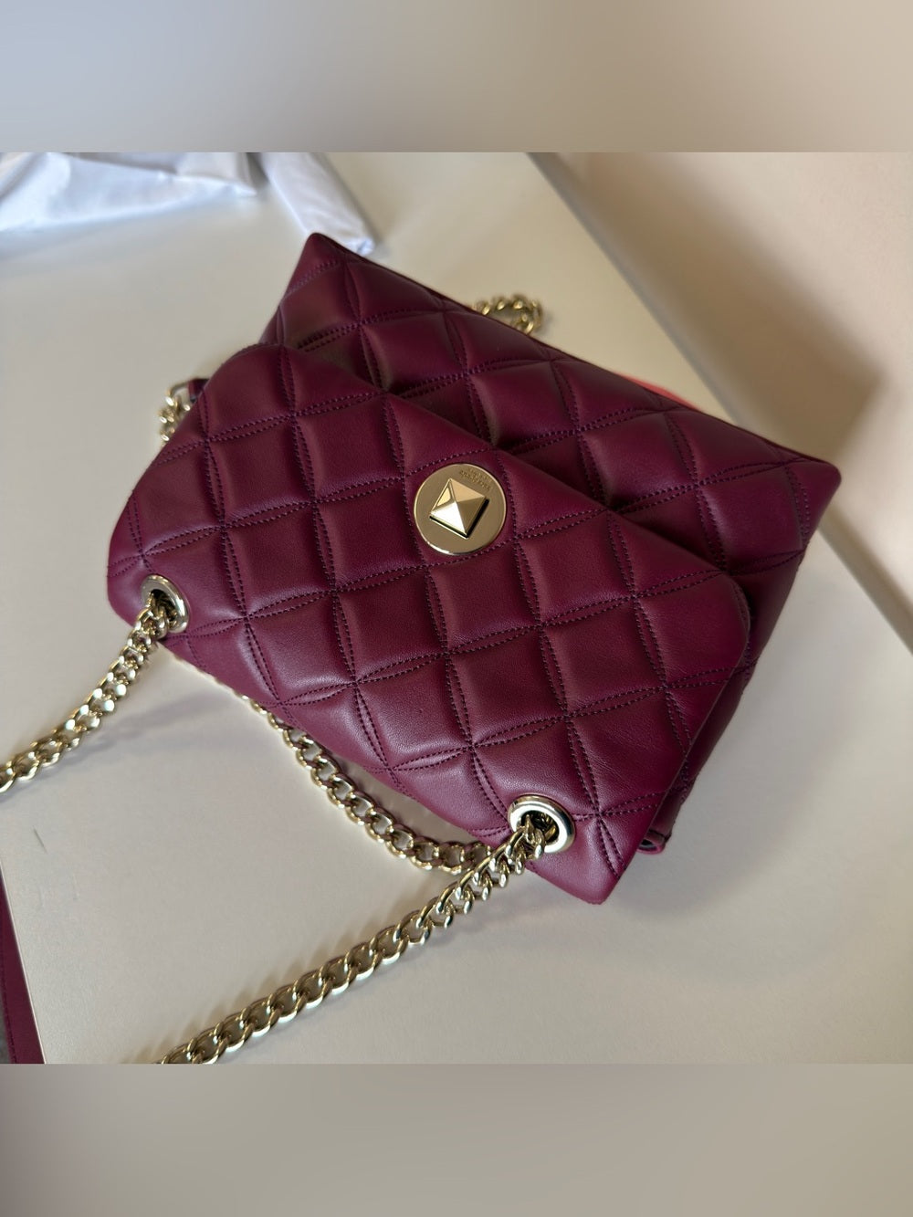 Kate Spade quilted shoulder bag in deep berry detail
