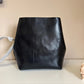 Rebecca Minkoff black leather structured backpack detail
