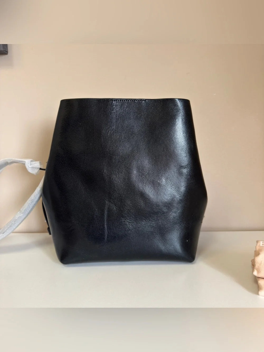Rebecca Minkoff black leather structured backpack detail