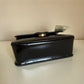 Tory Burch Robinson Spazzolato small top handle bag detail