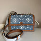 Tory Burch T Monogram denim shoulder bag in blue and brown detail