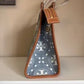 Tory Burch T Monogram blue and tan denim small tote detail