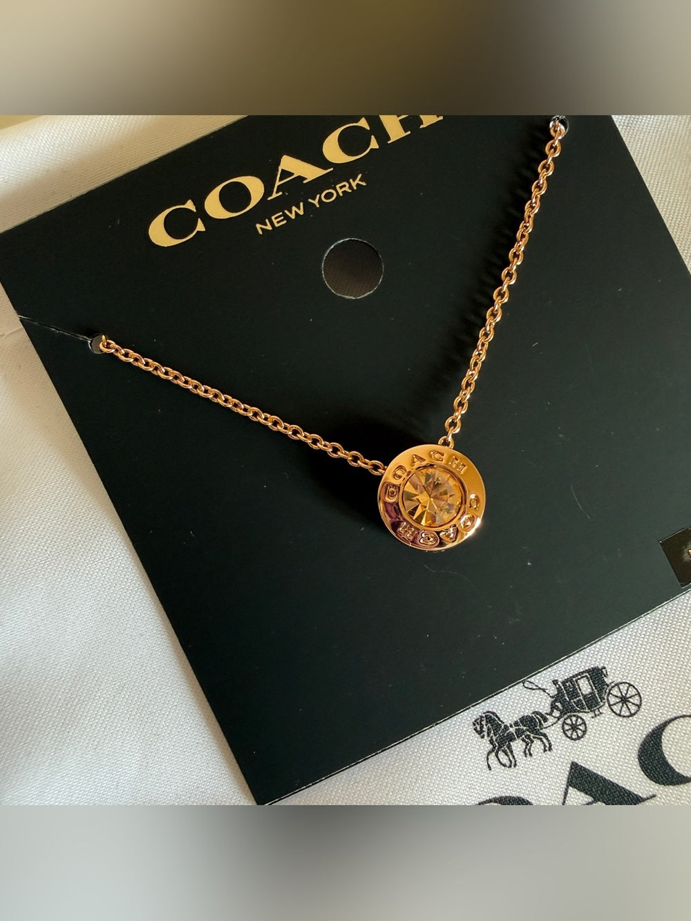 Coach 54514 rose gold disc pendant necklace detail
