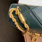 Tory Burch Fleming dark green leather shoulder bag detail