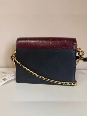 Tory Burch Robinson burgundy black and cream crossbody bag detail