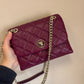 Kate Spade quilted shoulder bag in deep berry detail