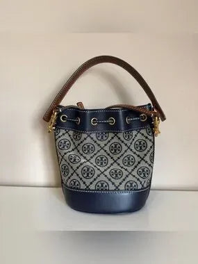Tory Burch blue and brown mini bucket bag detail