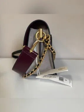 Tory Burch Robinson burgundy black and cream crossbody bag detail