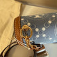 Tory Burch T Monogram denim shoulder bag in blue and brown detail
