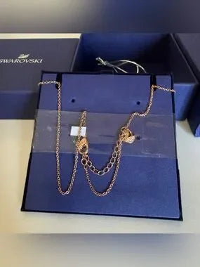 Swarovski rose gold key pendant necklace detail