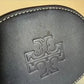 Tory Burch blue and brown mini bucket bag detail