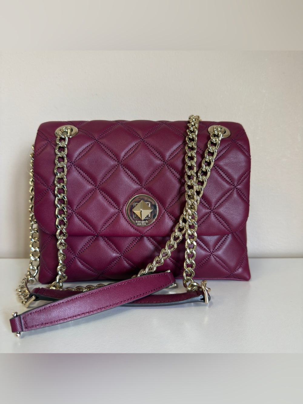 Kate Spade quilted shoulder bag in deep berry detail