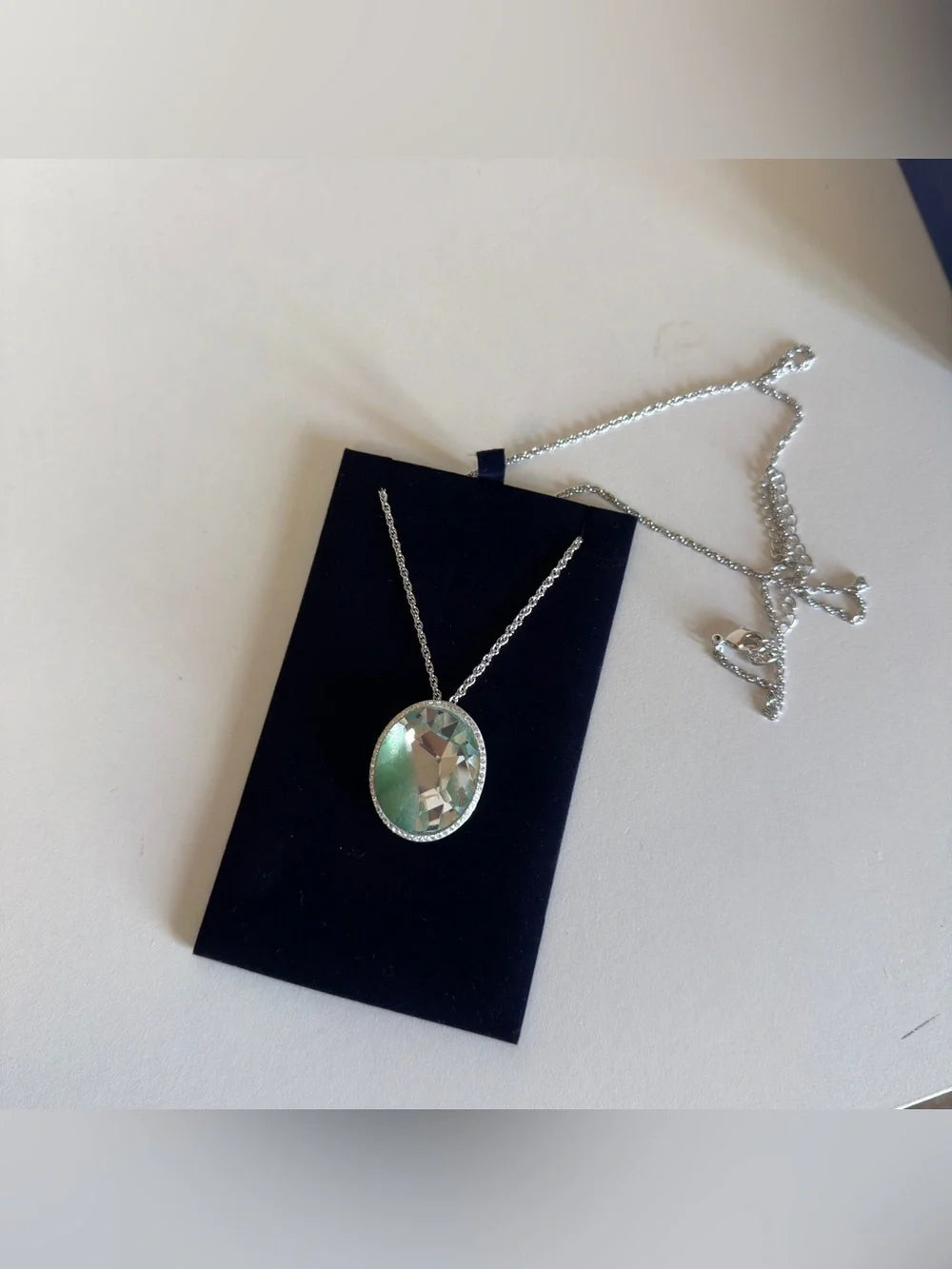 Swarovski green and silver crystal pendant necklace detail