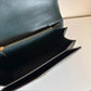 Tory Burch Fleming dark green leather shoulder bag detail