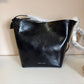 Rebecca Minkoff black leather structured backpack detail