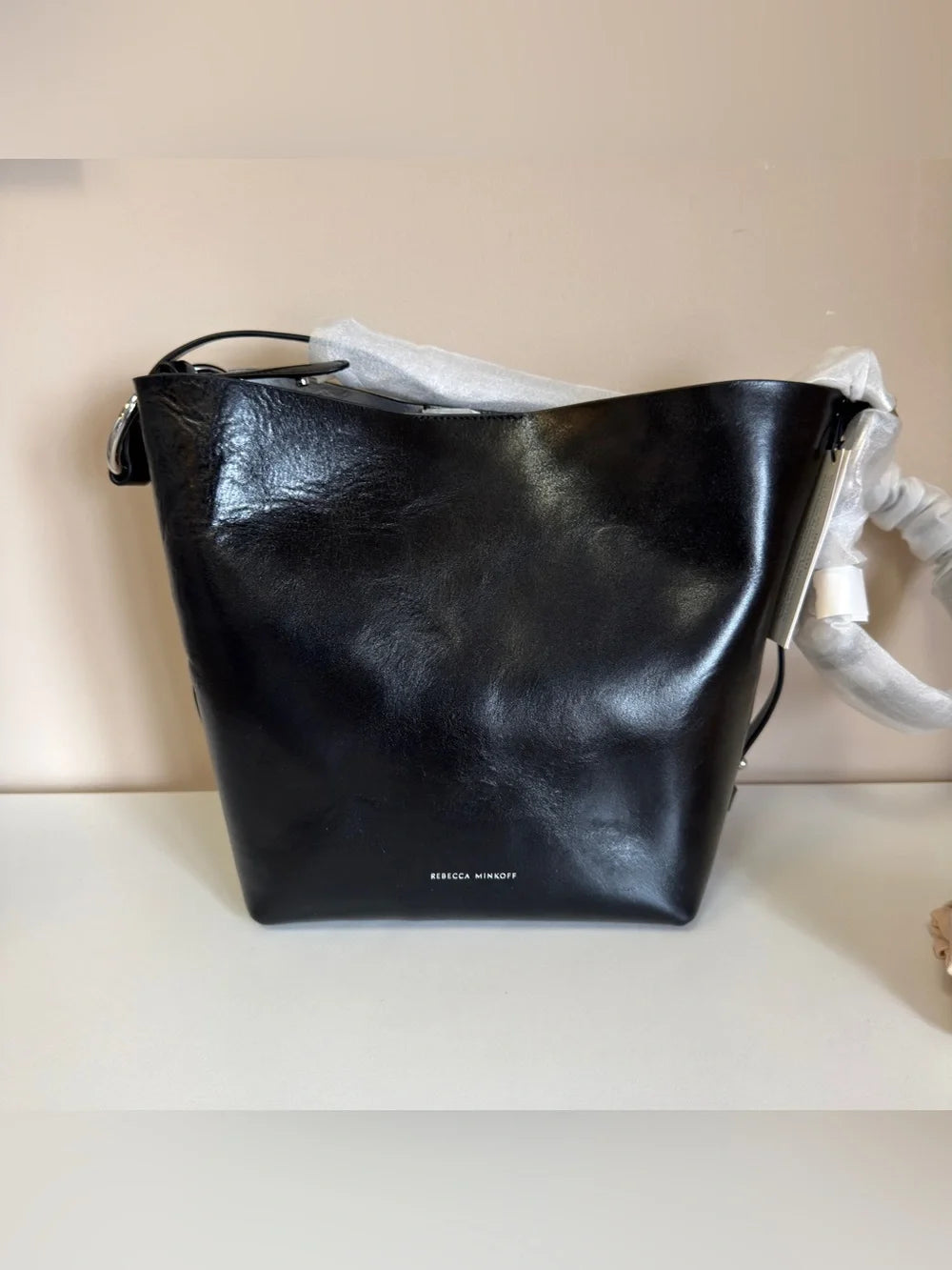 Rebecca Minkoff black leather structured backpack detail