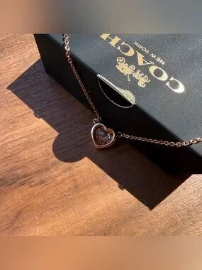 Coach F27135 rose gold heart necklace detail