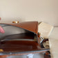 Tory Burch Robinson small brown top handle bag detail
