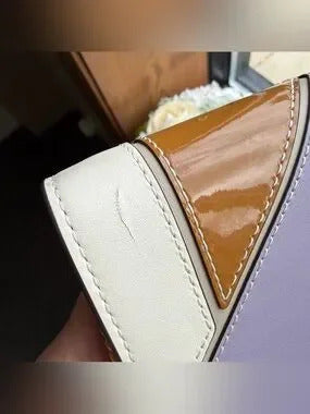 Tory Burch Robinson patchwork chain wallet detail