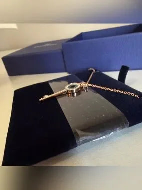 Swarovski rose gold key pendant necklace detail