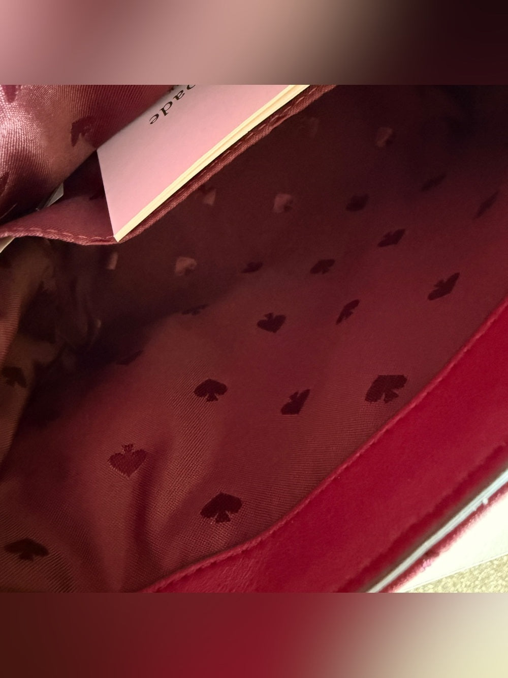 Kate Spade quilted shoulder bag in deep berry detail