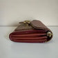 Coach 6909 burgundy and tan colorblock chain crossbody bag detail