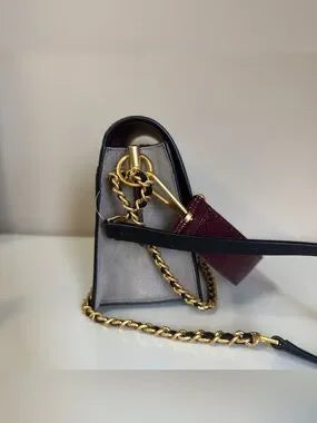 Tory Burch Robinson burgundy black and cream crossbody bag detail