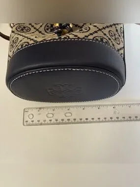 Tory Burch blue and brown mini bucket bag detail