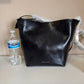 Rebecca Minkoff black leather structured backpack detail