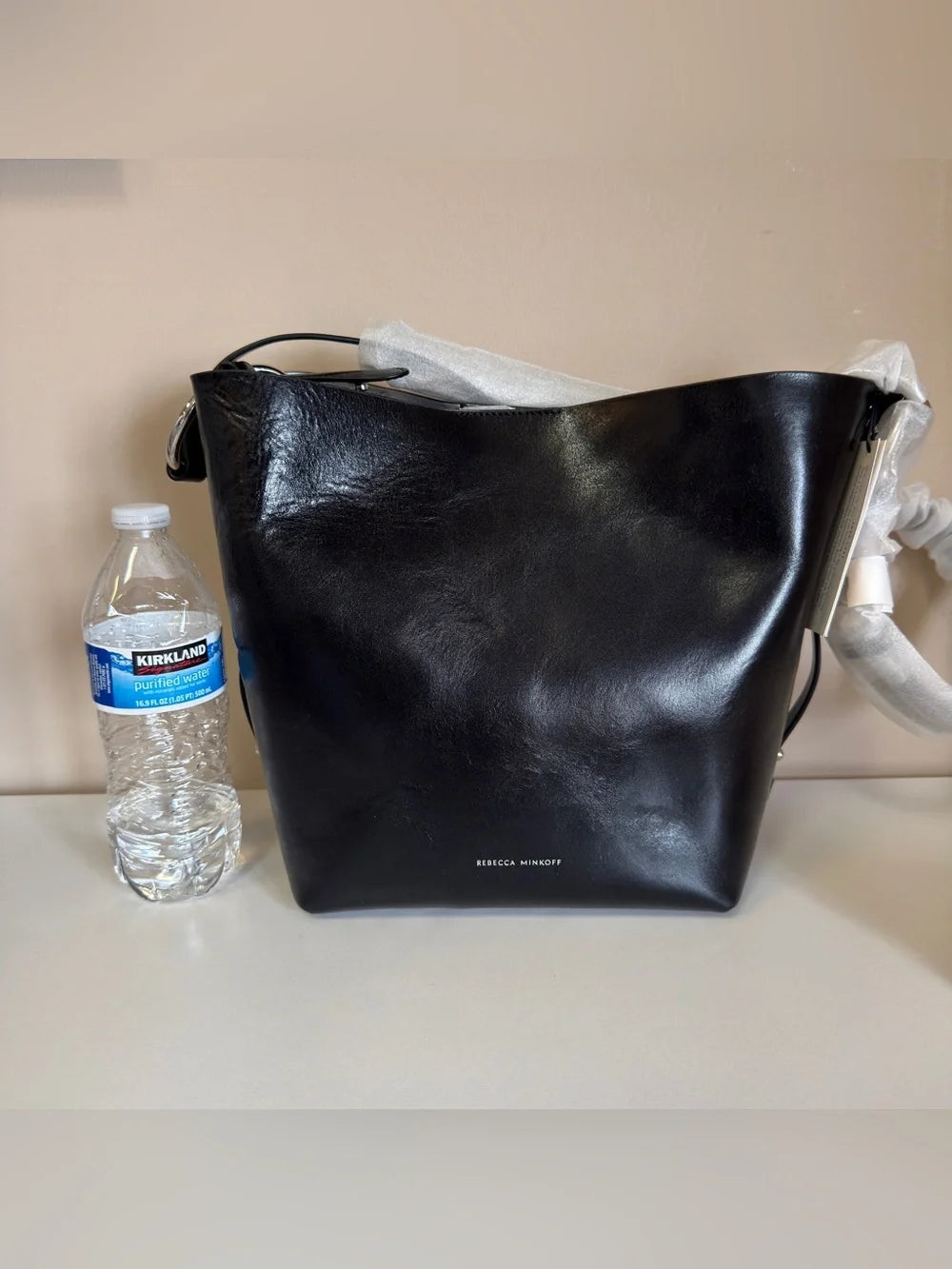 Rebecca Minkoff black leather structured backpack detail