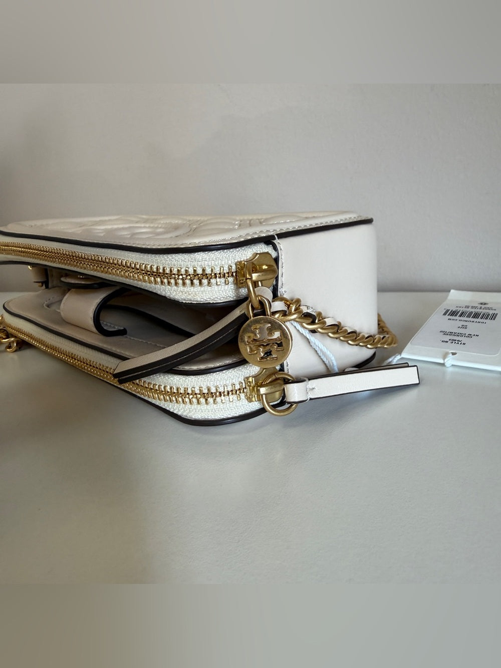 Tory Burch quilted cream leather chain crossbody detail