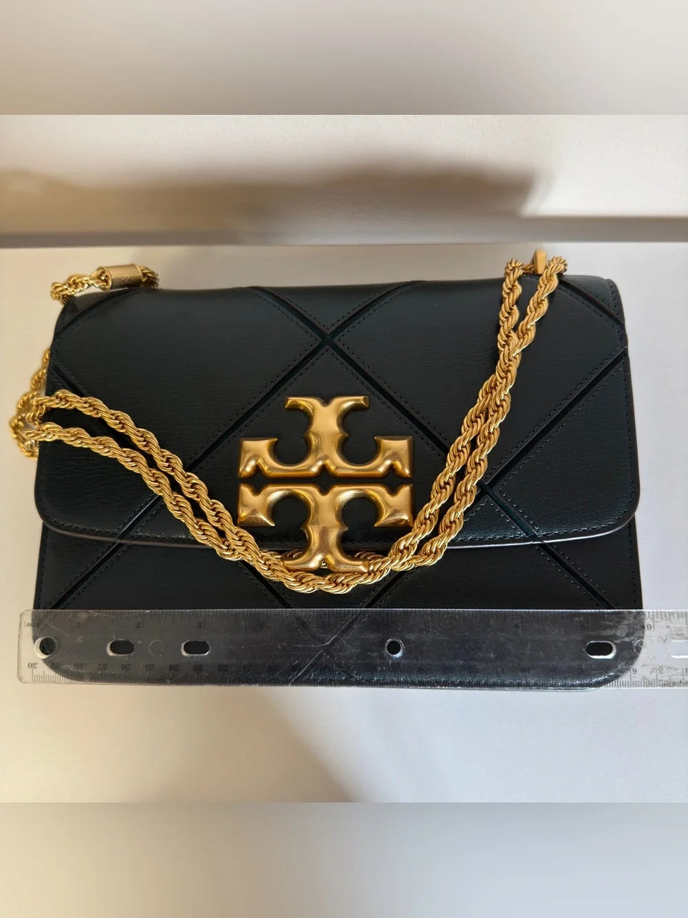 Tory Burch Fleming dark green leather shoulder bag detail
