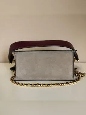 Tory Burch Robinson burgundy black and cream crossbody bag detail