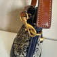 Tory Burch blue and brown mini bucket bag detail