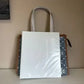 Tory Burch T Monogram blue and tan denim small tote detail