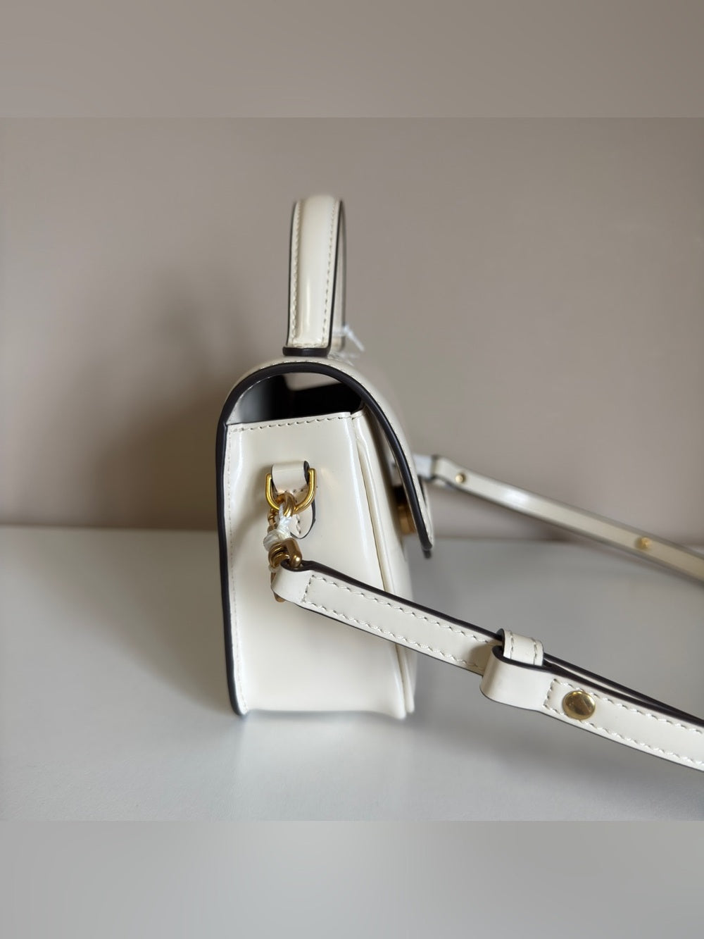 Tory Burch Robinson top handle bag detail