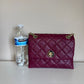 Kate Spade quilted shoulder bag in deep berry detail