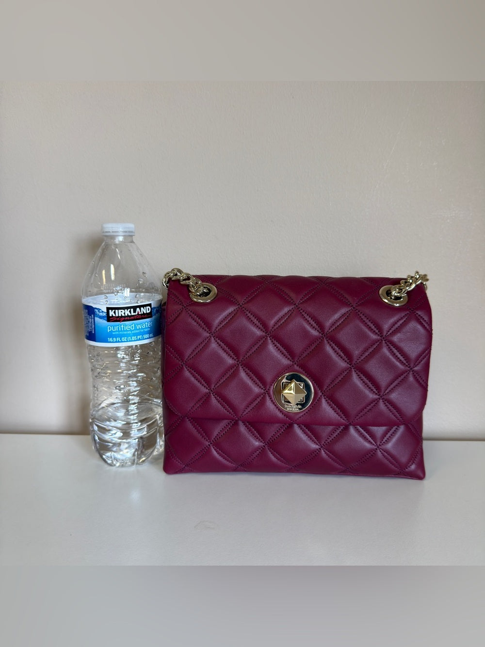 Kate Spade quilted shoulder bag in deep berry detail